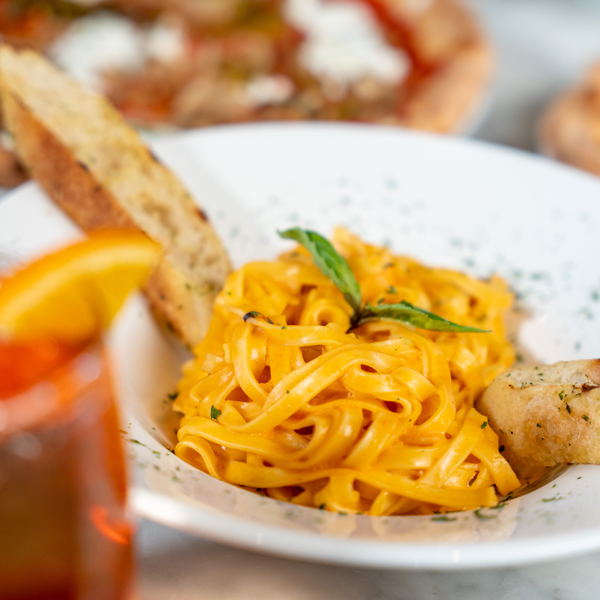 Plate of pasta with crostinis